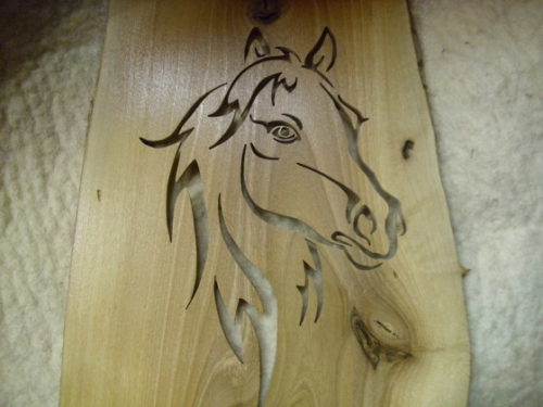lovat ábrázoló fa kép